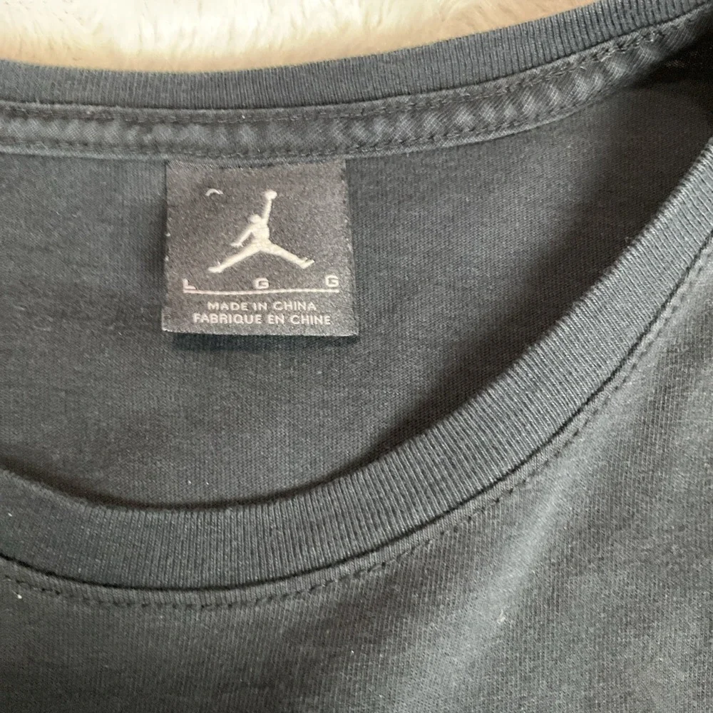 Air JORDAN Men's Black Larger Black History Month Graphic Pullover Long Sleeve
